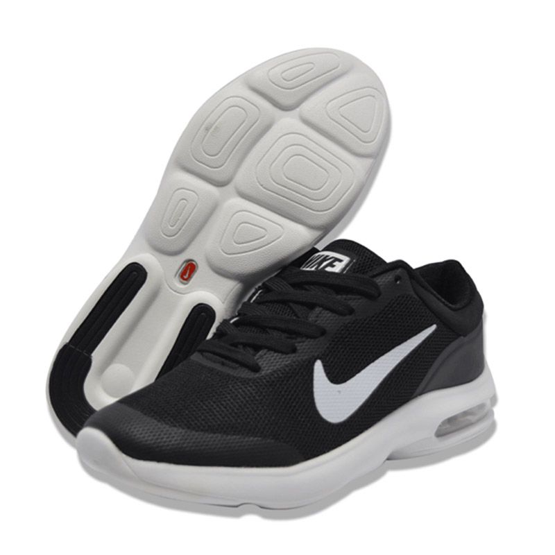 black nike shoes with white soles